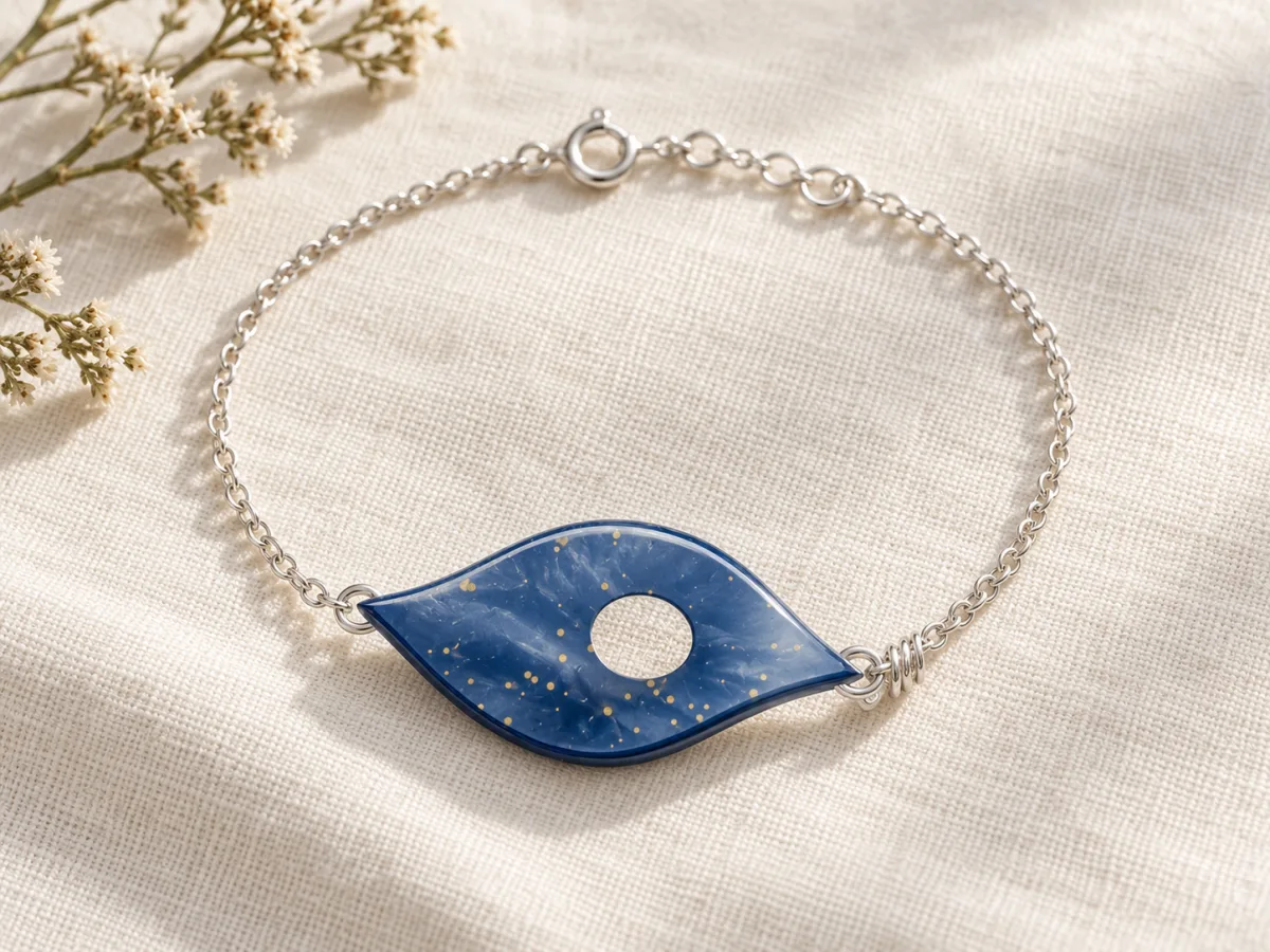 Midnight blue leaf bracelet with gold flecks on linen