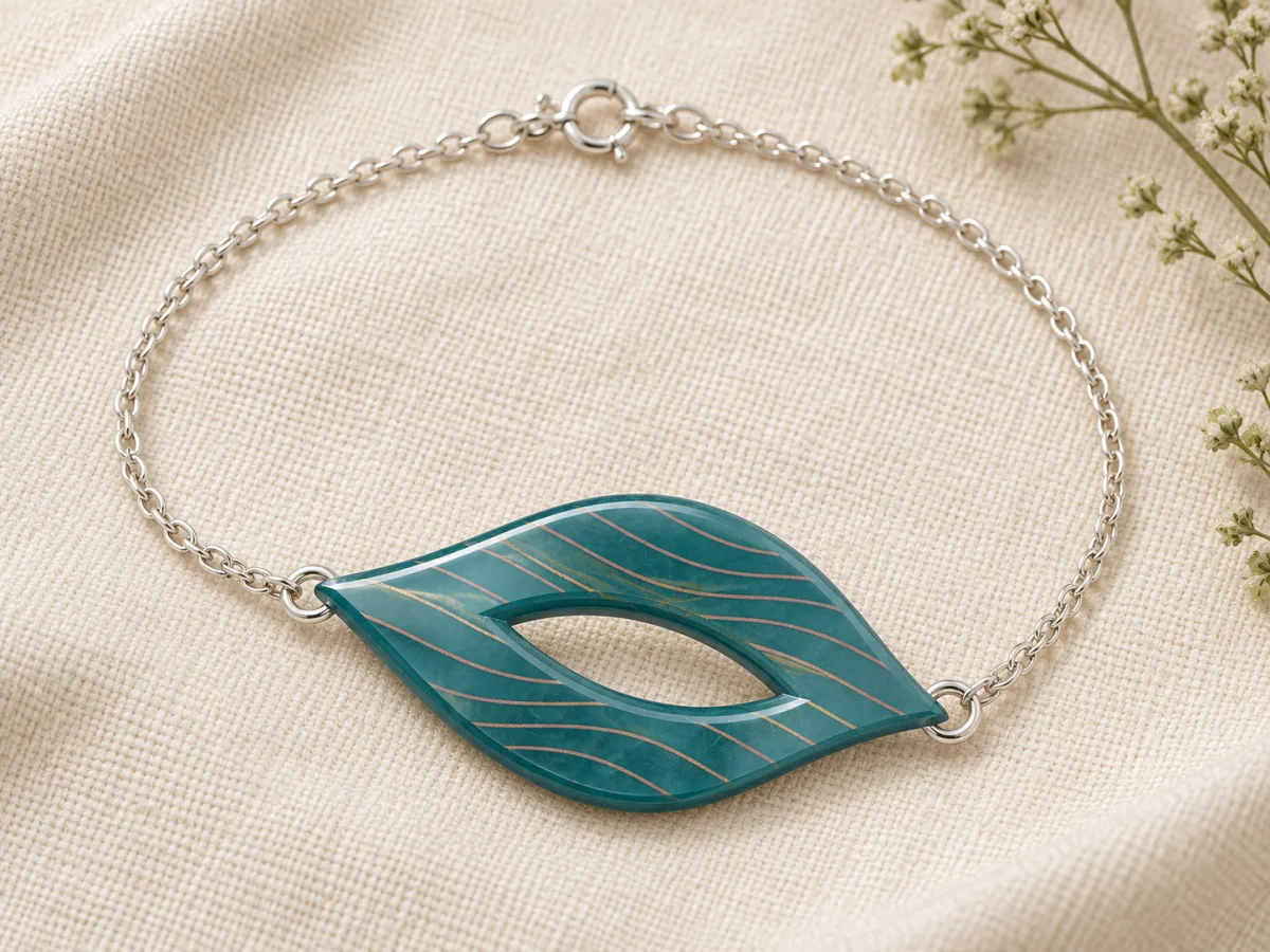 Teal leaf bracelet with fine rose-gold wave lines