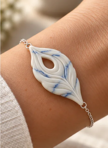 Blue-veined ivory feather bracelet
